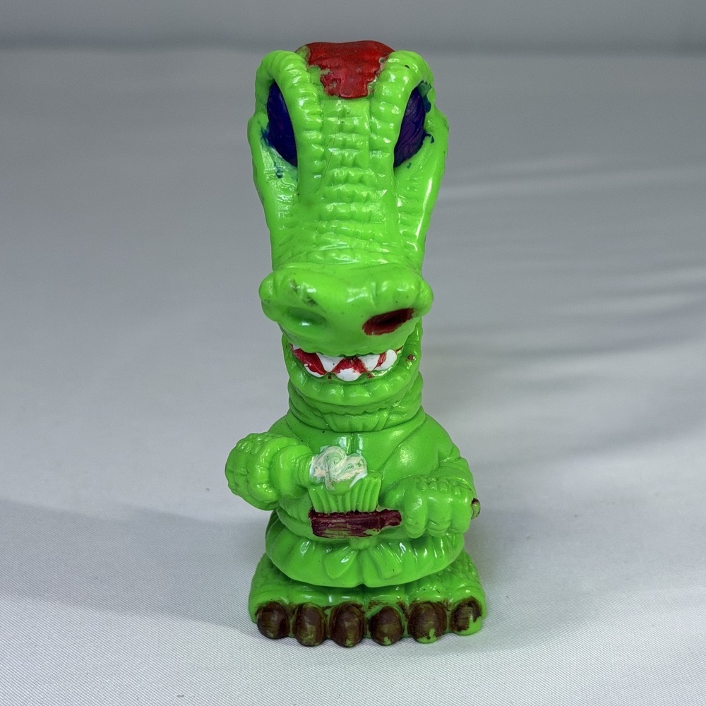 Vintage Wendys. Green Dinosaur Alligator Santa Hat Cupcake Monster Action Figure